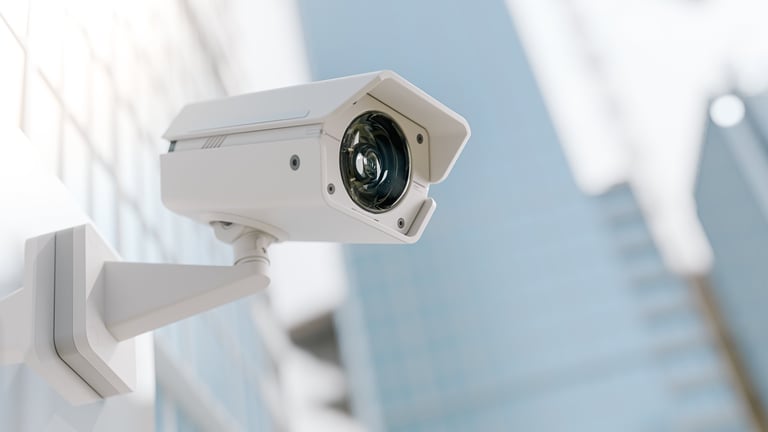 Bolide IP security camera mounted on building wall for professional surveillance